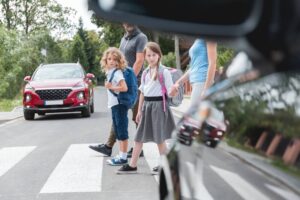 School children crossing the street.