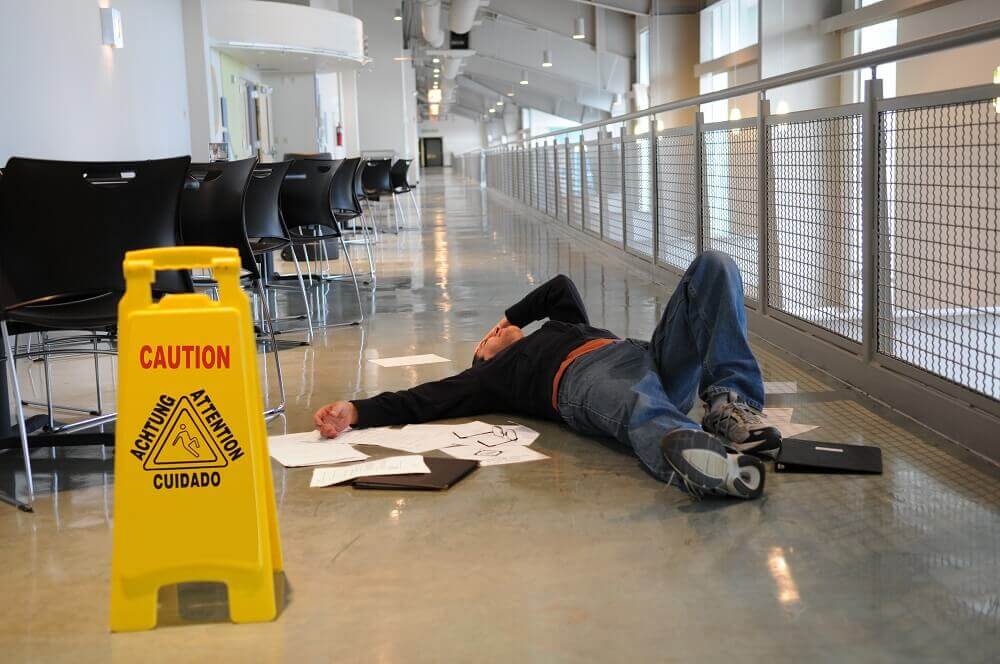Injured worker slip from slippery floor.